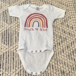 Laughing Giraffe White Baby Onesie with Rainbow Print